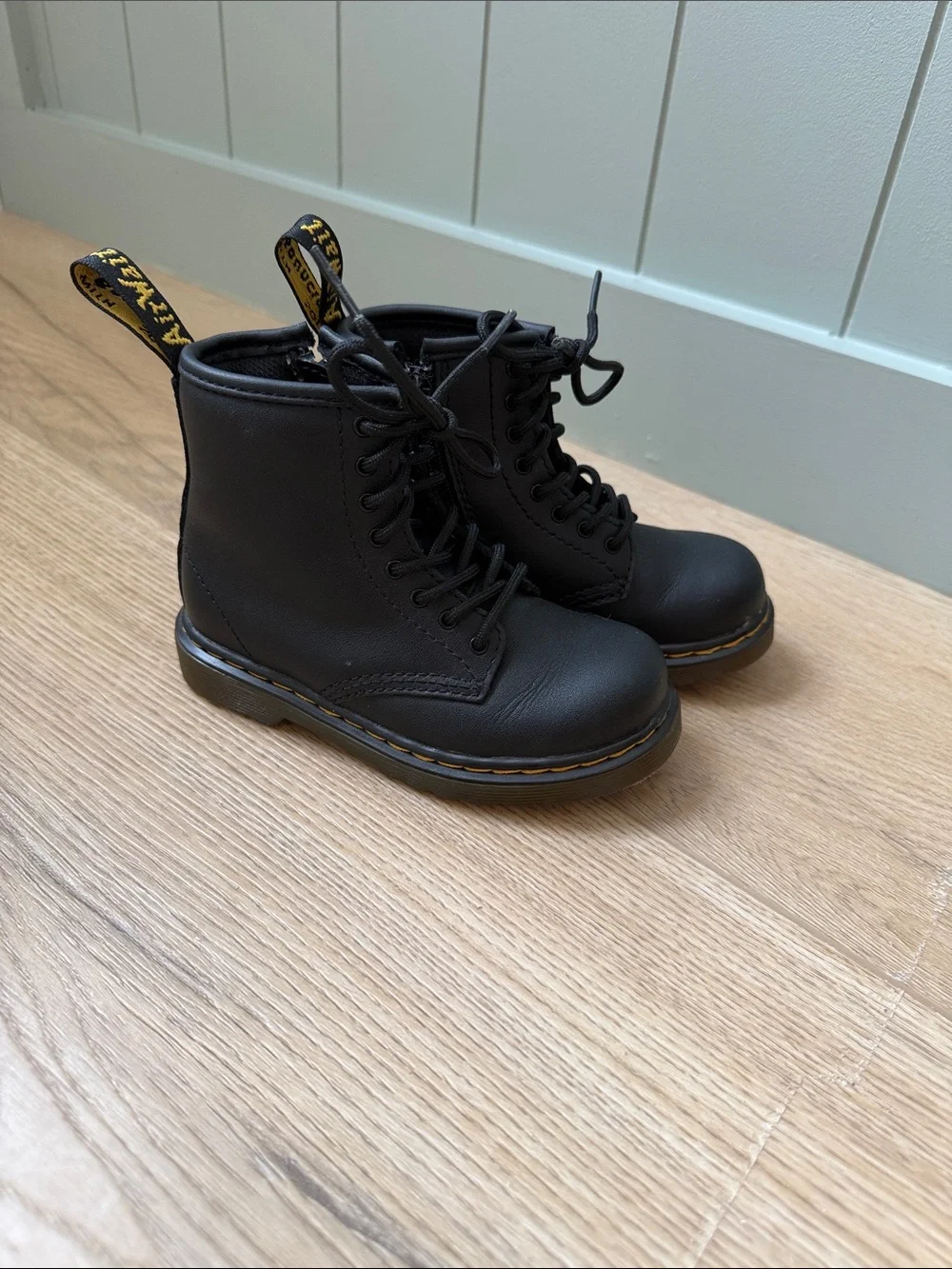 Dr. Martens Black Leather Lace-Up Boots with Yellow Heel Loop